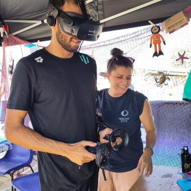 Gregorio Paltrinieri trying the Healthy Seas virtual reality experience in Cattolica.